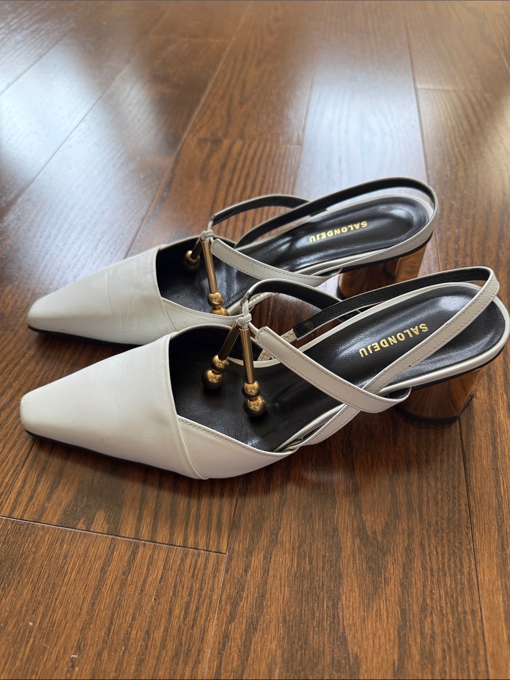 Salondeju White Pointed Slingback Heels with Gold Accent